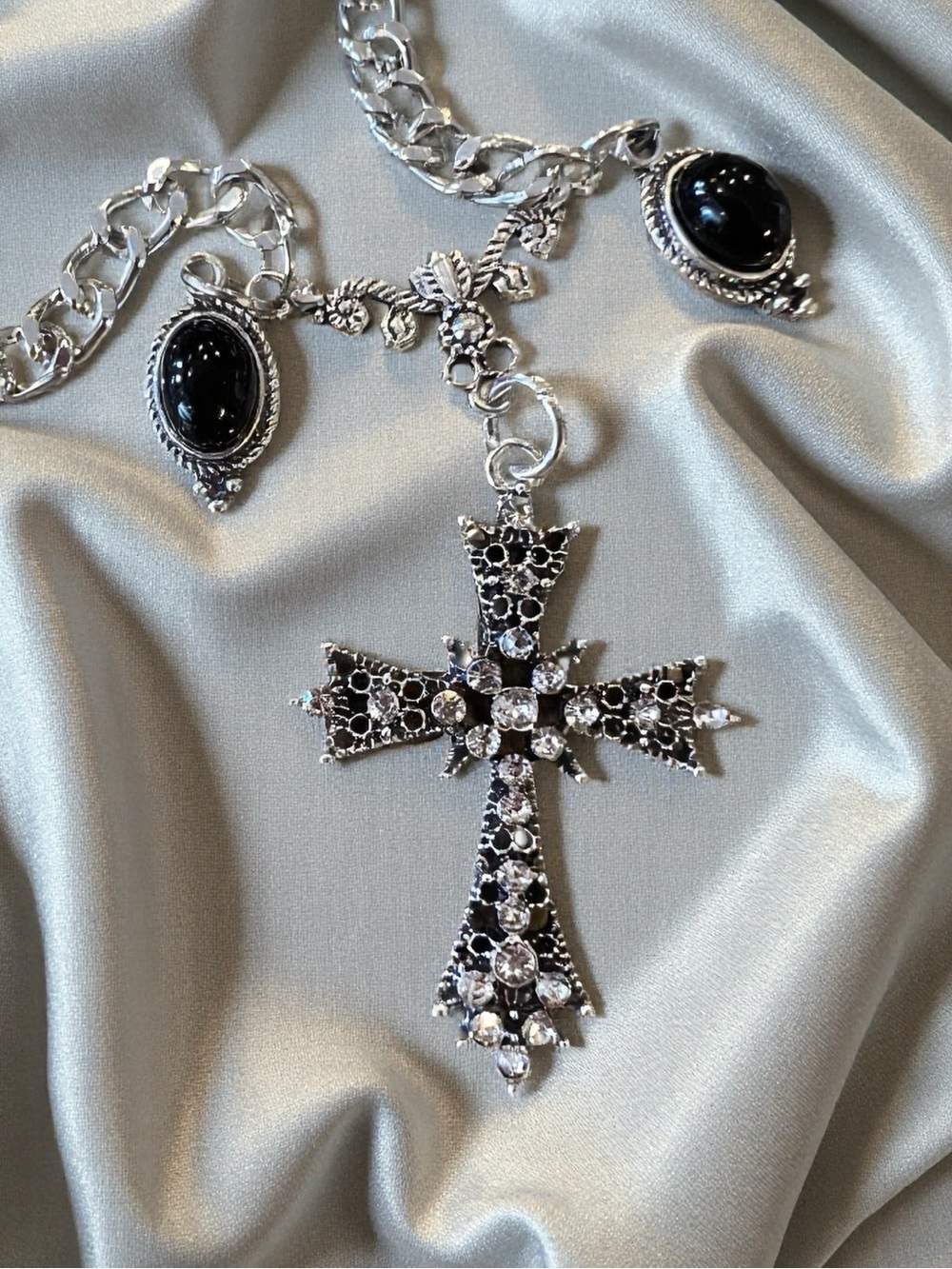 Silver Rhinestone Cross Pendant Necklace with Black Charm Accents